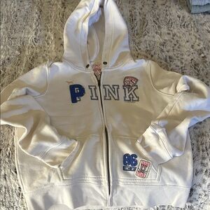 PINK Victoria's Secret Cream Zip-Up Hoodie with Blue Appliqué